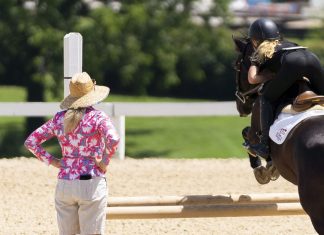 Trainer Tuesday: With a rider who has–or maybe has been taught to have–an exaggerated release, how do you teach and have them practice ‘letting the horse jump up to you’?